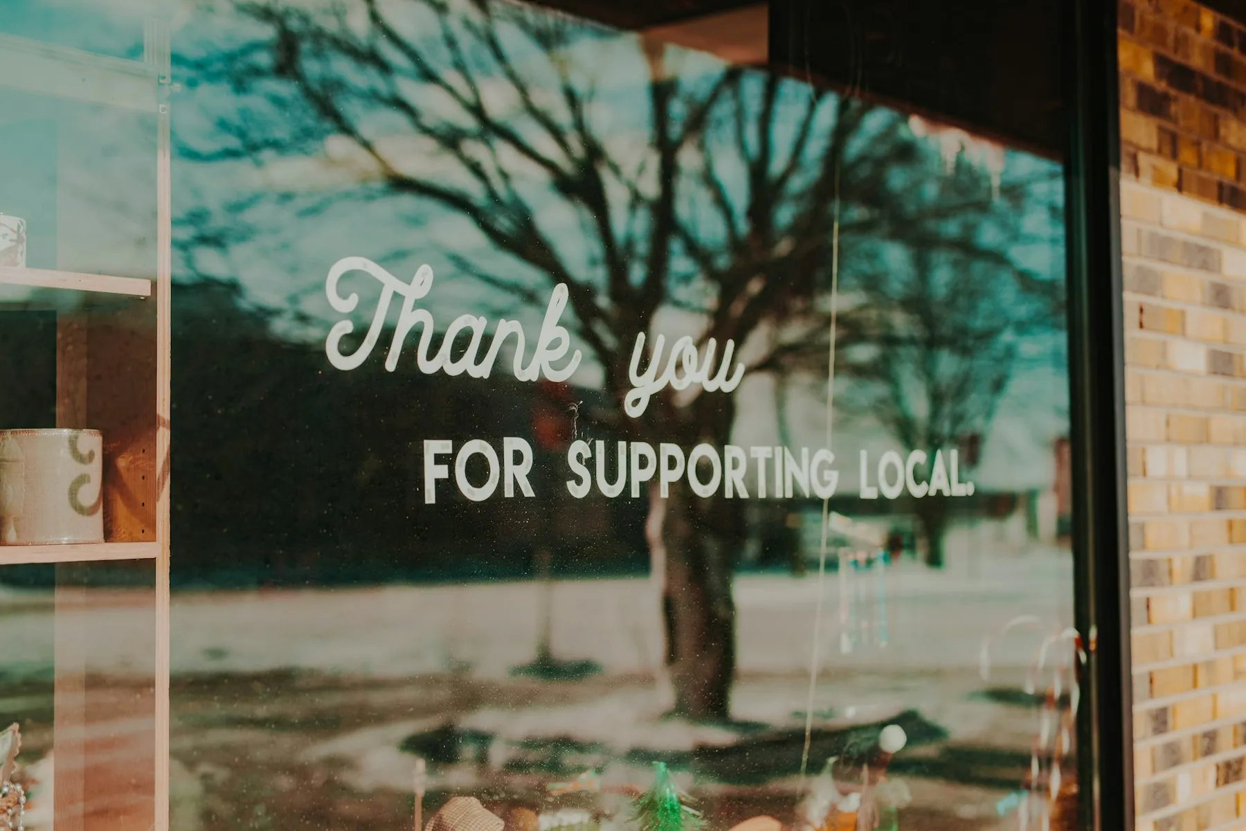 Thank you for supporting local, hand-lettered on a small shop window